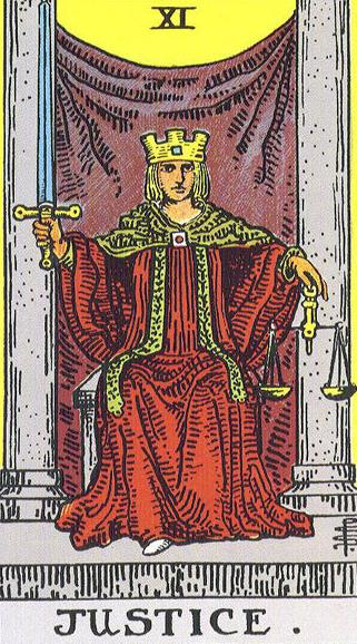 the tarot card of justice. A ruler holds a sword in one hand and a scales in the other